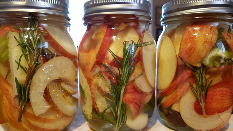 Pickled apples in a jar