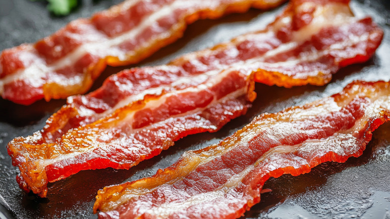 Bacon strips on cutting board