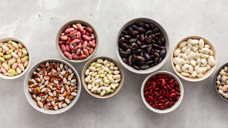 Different types of beans in bowls