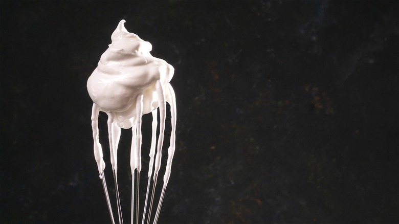 Whipped topping on whisk