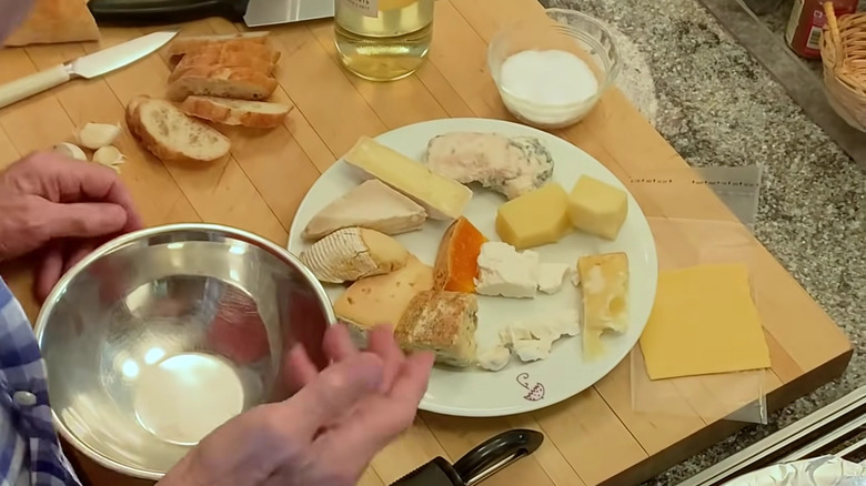 Jacques Pépin using leftover cheese