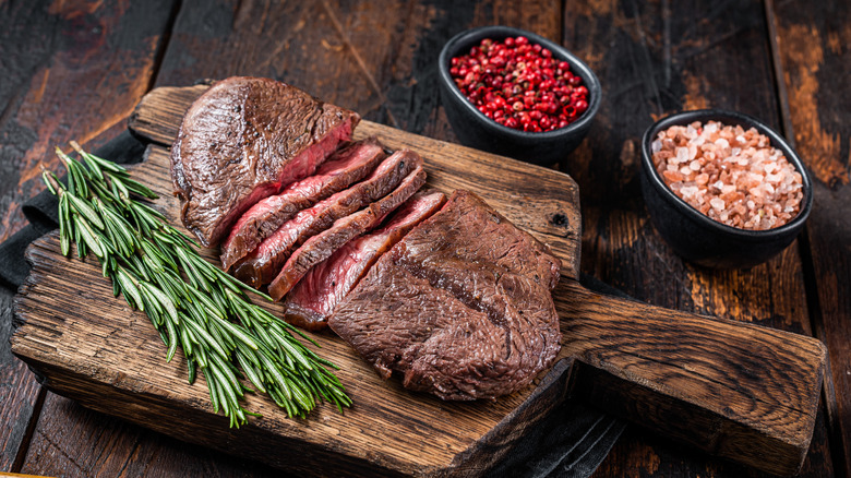 flat iron steak on cutting board