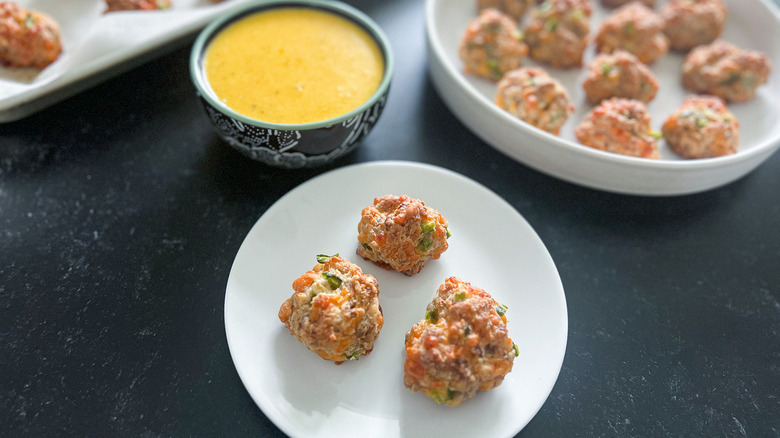 sausage balls and cheese sauce