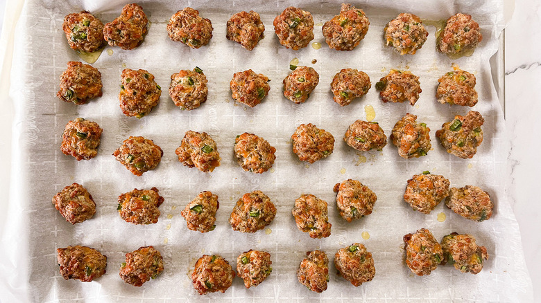 baked sausage balls on sheet