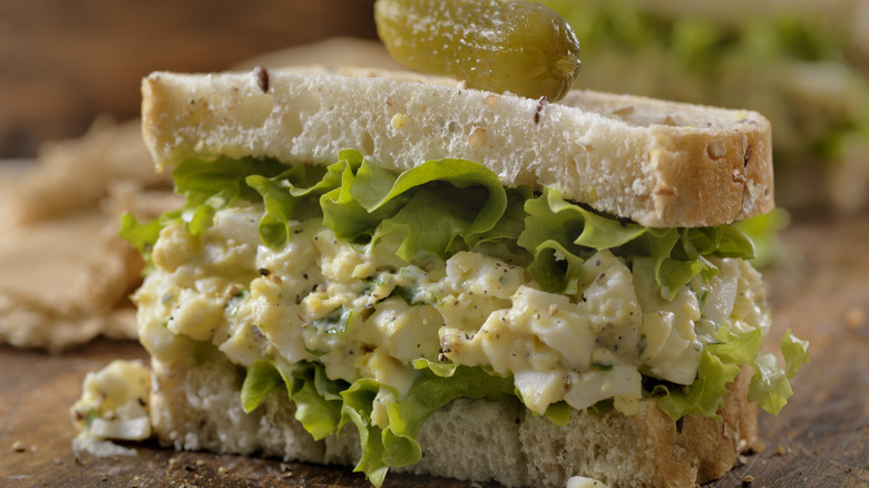 Egg salad sandwich with cornichon