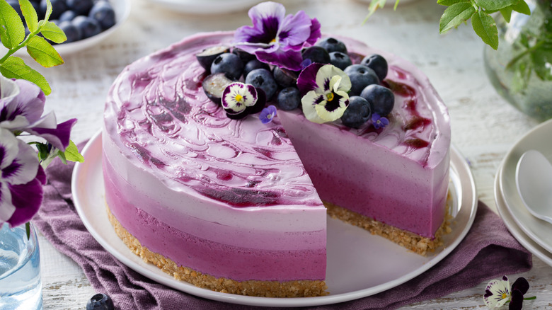 Blueberry cheesecake with a slice removed