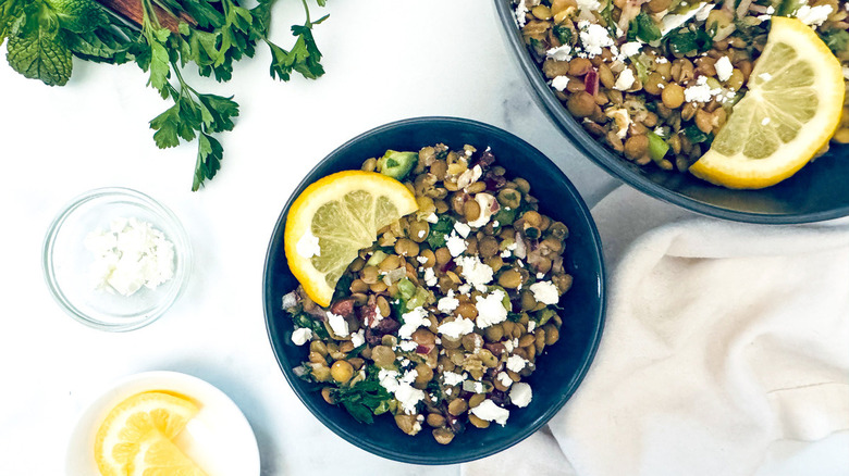 lentil salad in black bowl