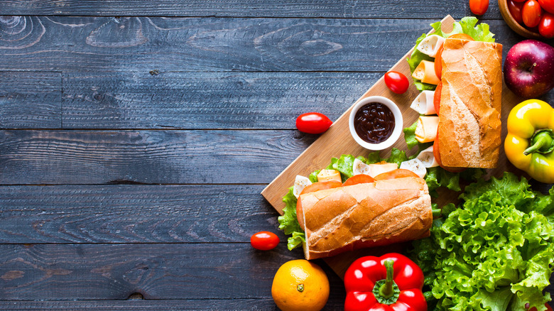 sandwiches surrounded by vegetables