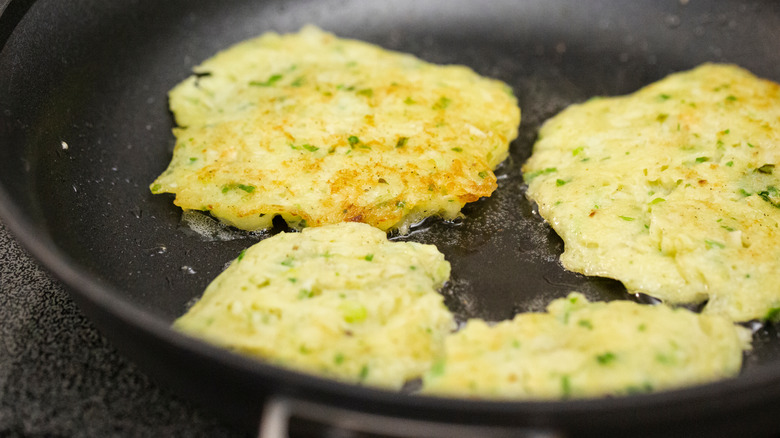 cooking latkes in pan