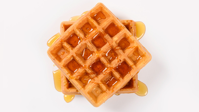 Waffles covered in syrup