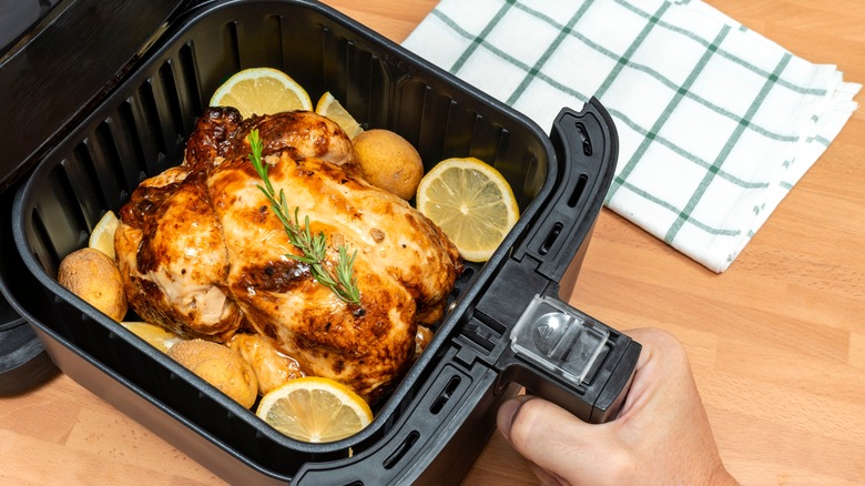 chicken inside an air fryer