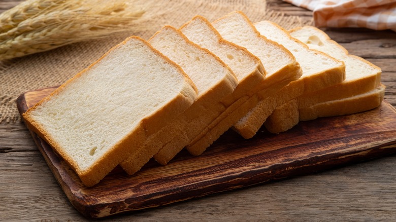 Bread slices on wooden pallet