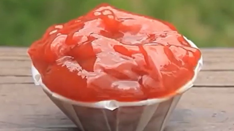 Expanded ketchup cup