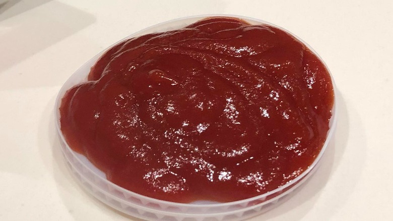 Drink lid full of ketchup