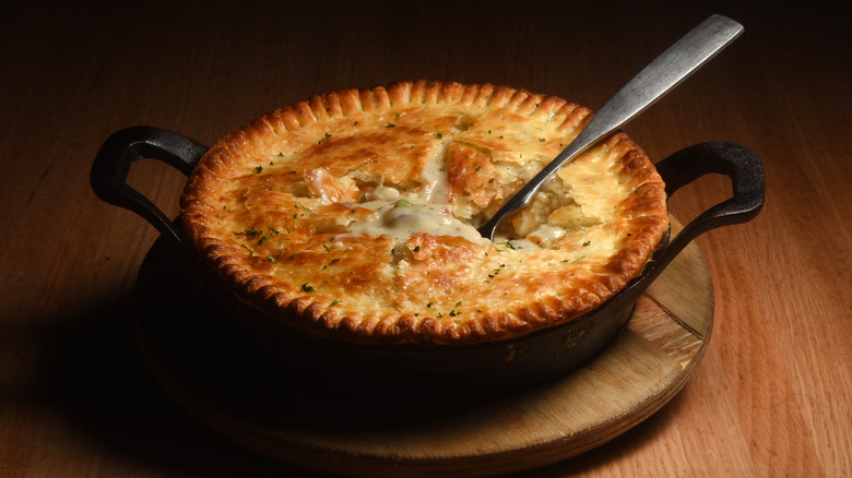 A chicken pot pie in a skillet