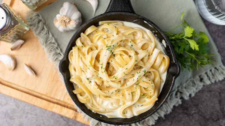 Pan of creamy alfredo noodles