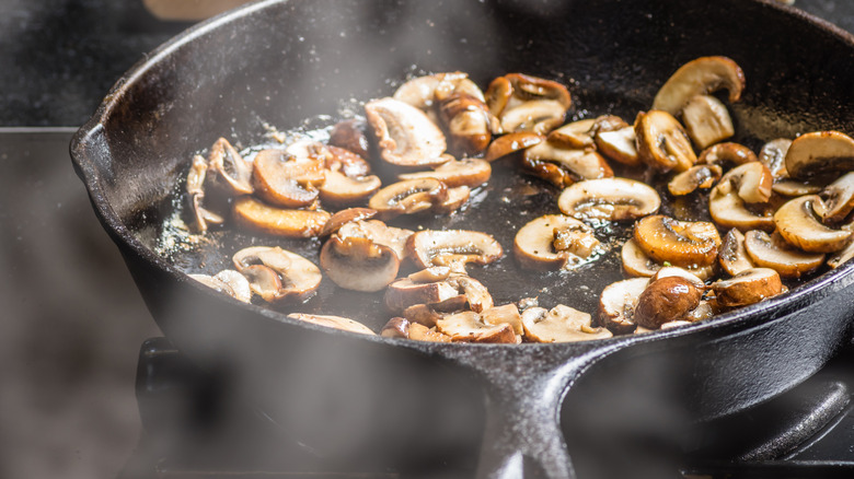 Sauteed mushrooms in cast iron pan