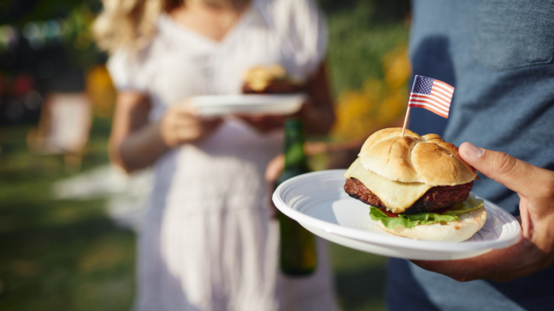 Burger with Mmerican flag pick on top