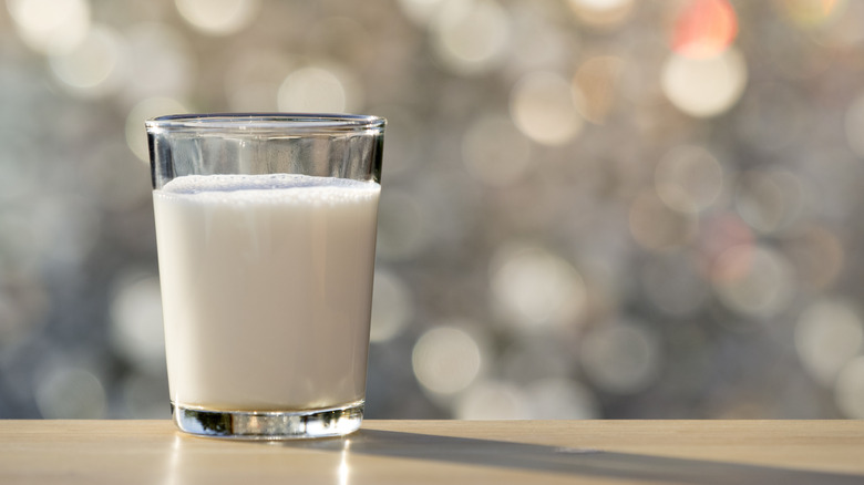 glass of milk on table