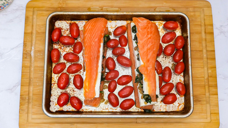 Easy Sheet Pan Feta-Stuffed Salmon With Cherry Tomatoes