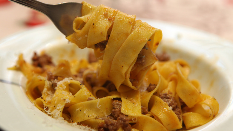 Fettuccine or lasagnette with ragu sauce and cheese