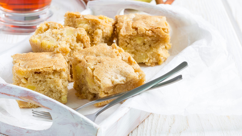 Blondies on a tray with forks