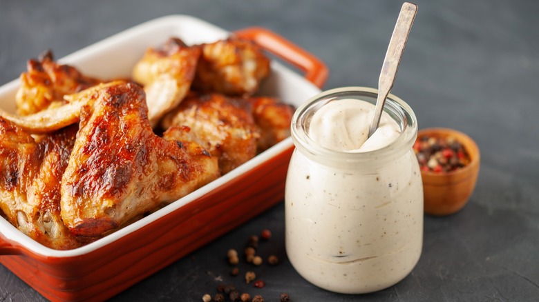 jar of Alabama white barbecue sauce and chicken