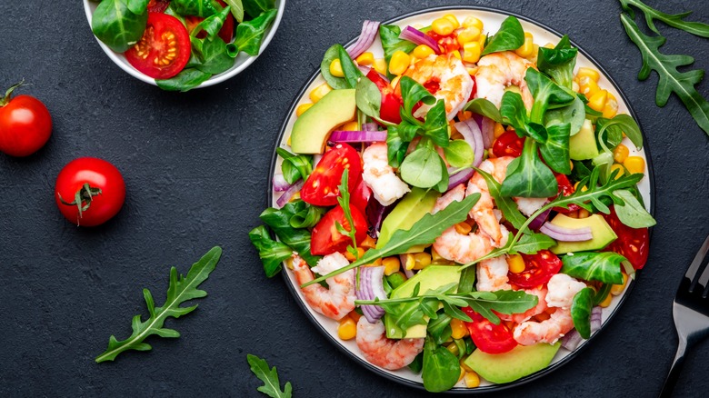 A plate of shrimp avocado salad