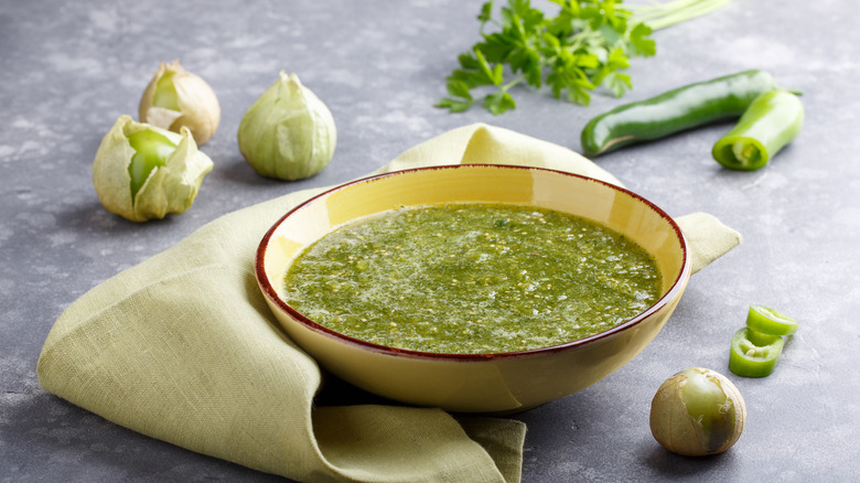 salsa verde in bowl with cilantro, green chiles, tomatillos