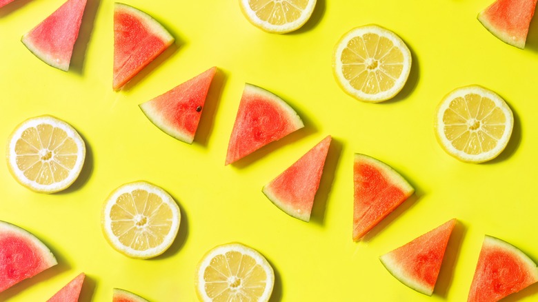 watermelon and lemon on yellow background