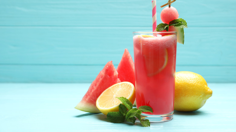 watermelon and lemon drink on blue background