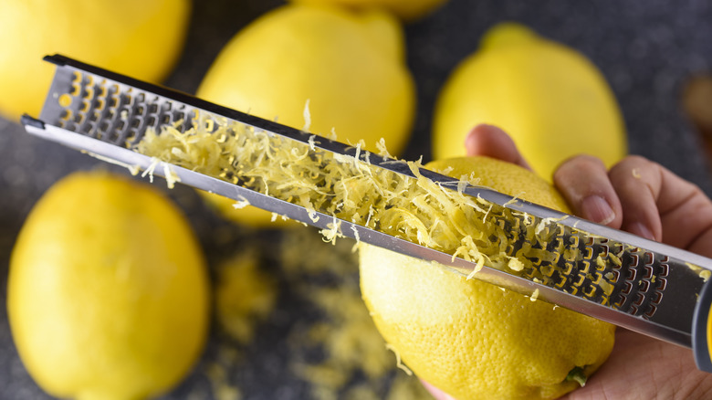 zesting a lemon with grater