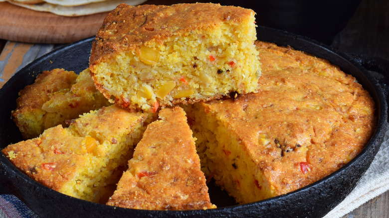 Slices of cornbread in a skillet