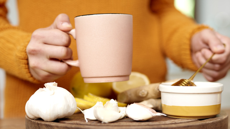 Garlic tea herbs honey lemon mug