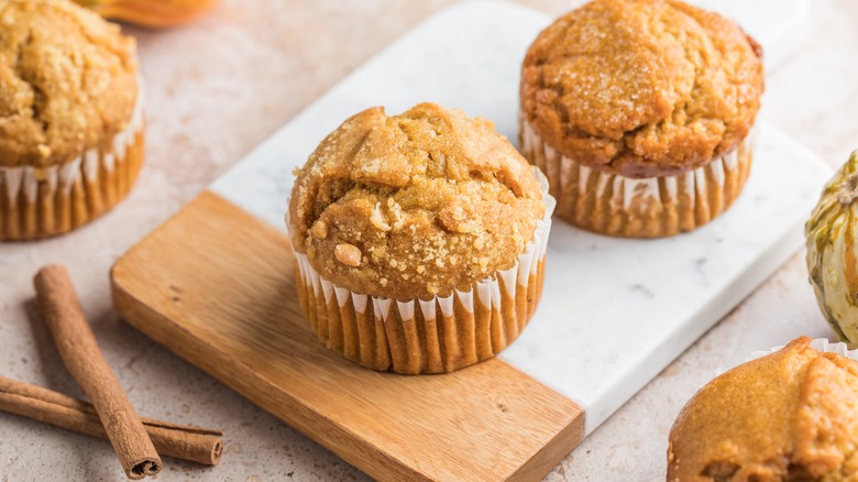 Pumpkin muffins with cinnamon sticks