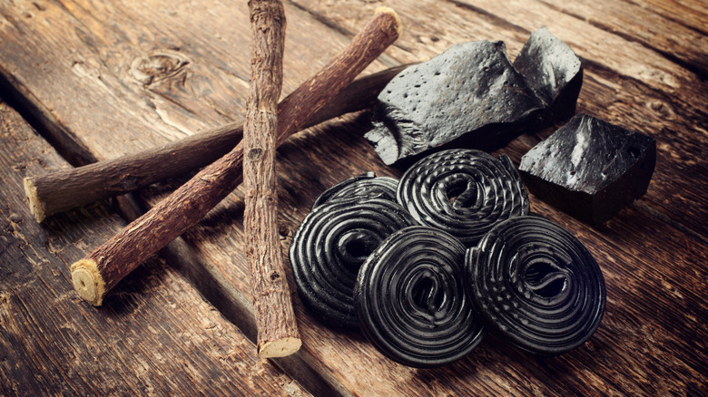 Licorice root next to licorice candy