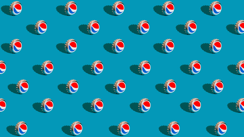 Pepsi bottle caps standing up