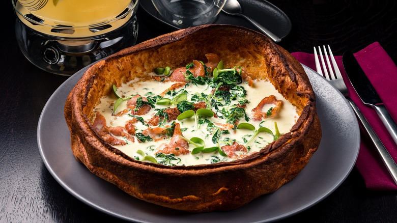 Savory Dutch baby on plate 