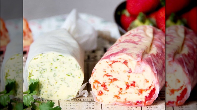 rolls of strawberry butter and herb butter