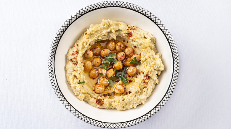 bowl of hummus with toppings