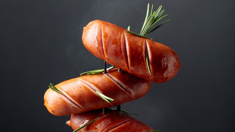 Skewered hot dogs with rosemary