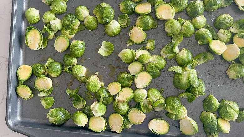 seasoned brussels sprouts on baking sheet