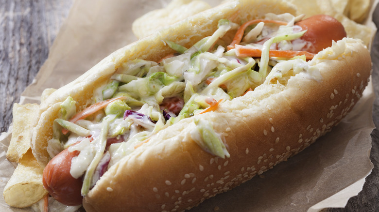 Creamy coleslaw on a hot dog