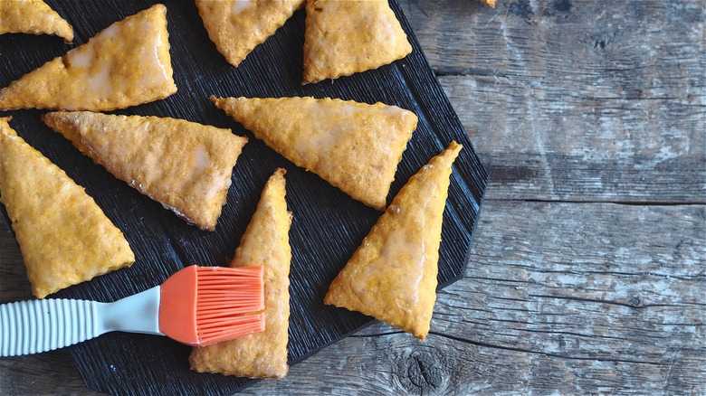 Baked scones with pastry brush 