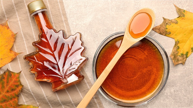 Maple syrup in bowl and bottle 