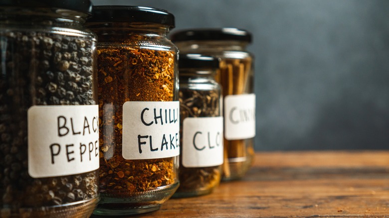 Spices in jars with handwritten labels