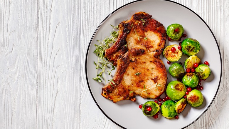 Cooked pork chops on plate