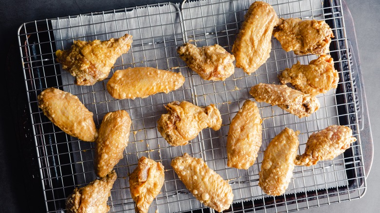 chicken wings on baking sheet