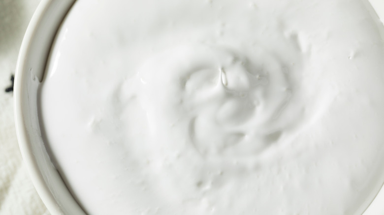 Marshmallow fluff in white bowl