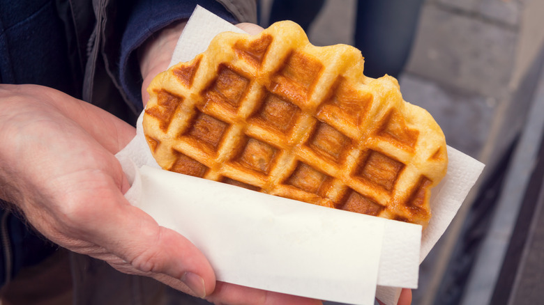 Person holding waffle